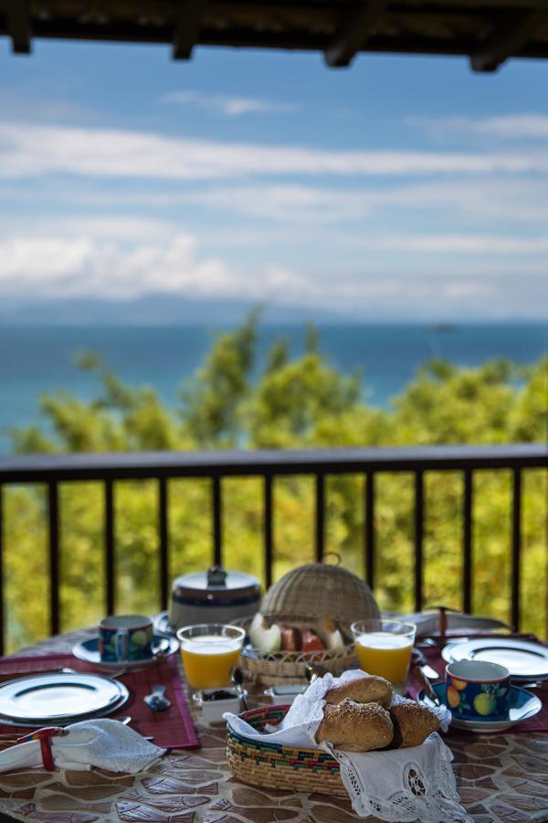 Casa Vermelha Guest House อิลญาเบลา ภายนอก รูปภาพ